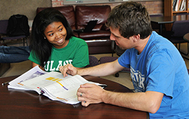 A tutor helping a student